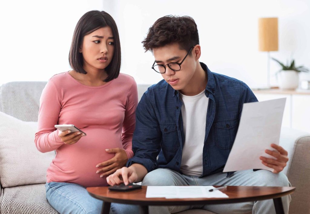 pregnant woman stressed on phone